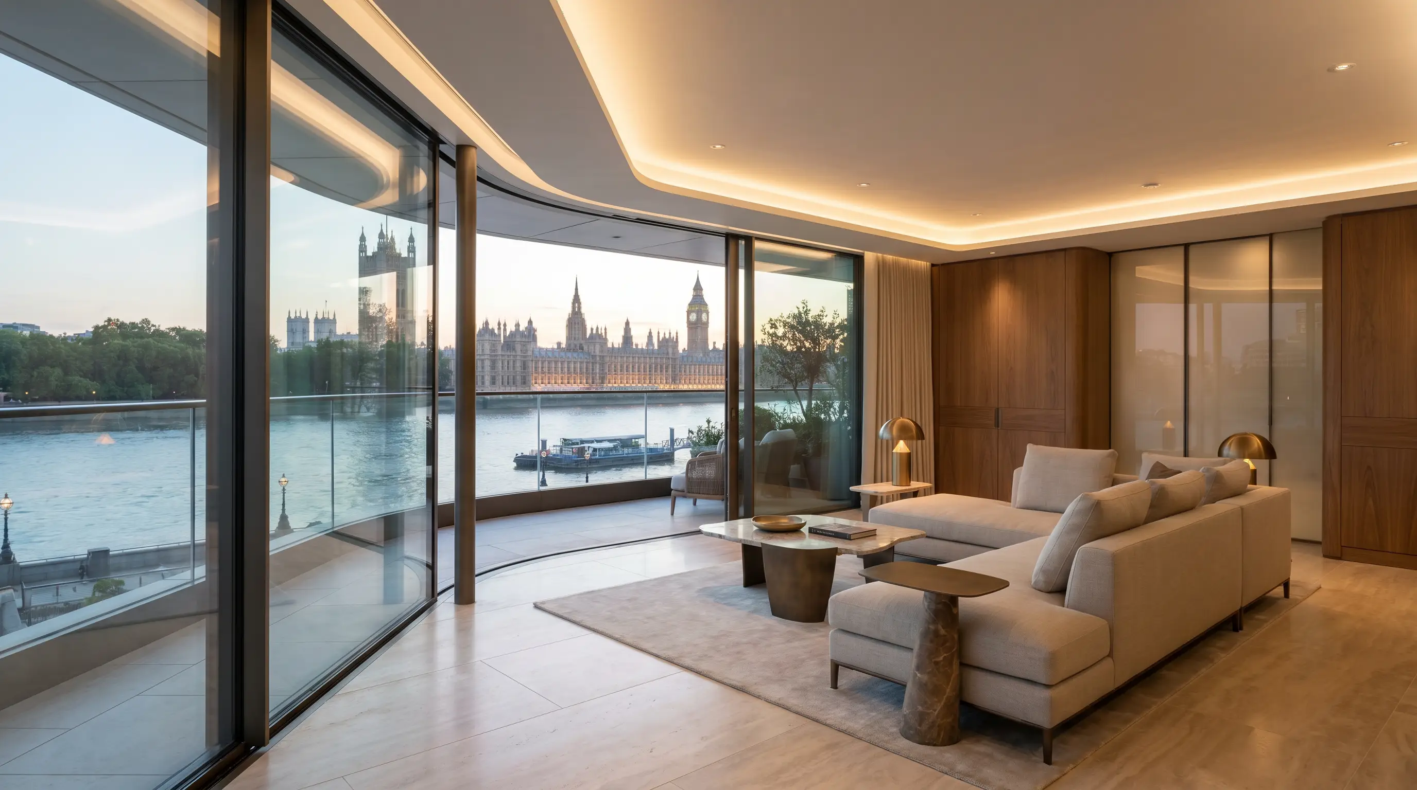 A Corniche living space with floor-to-ceiling curved glazing framing the river and Parliament